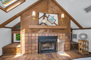 Upper Level Primary Bedroom Fireplace 1
