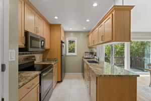 Kitchen granite counters maple cabinets
