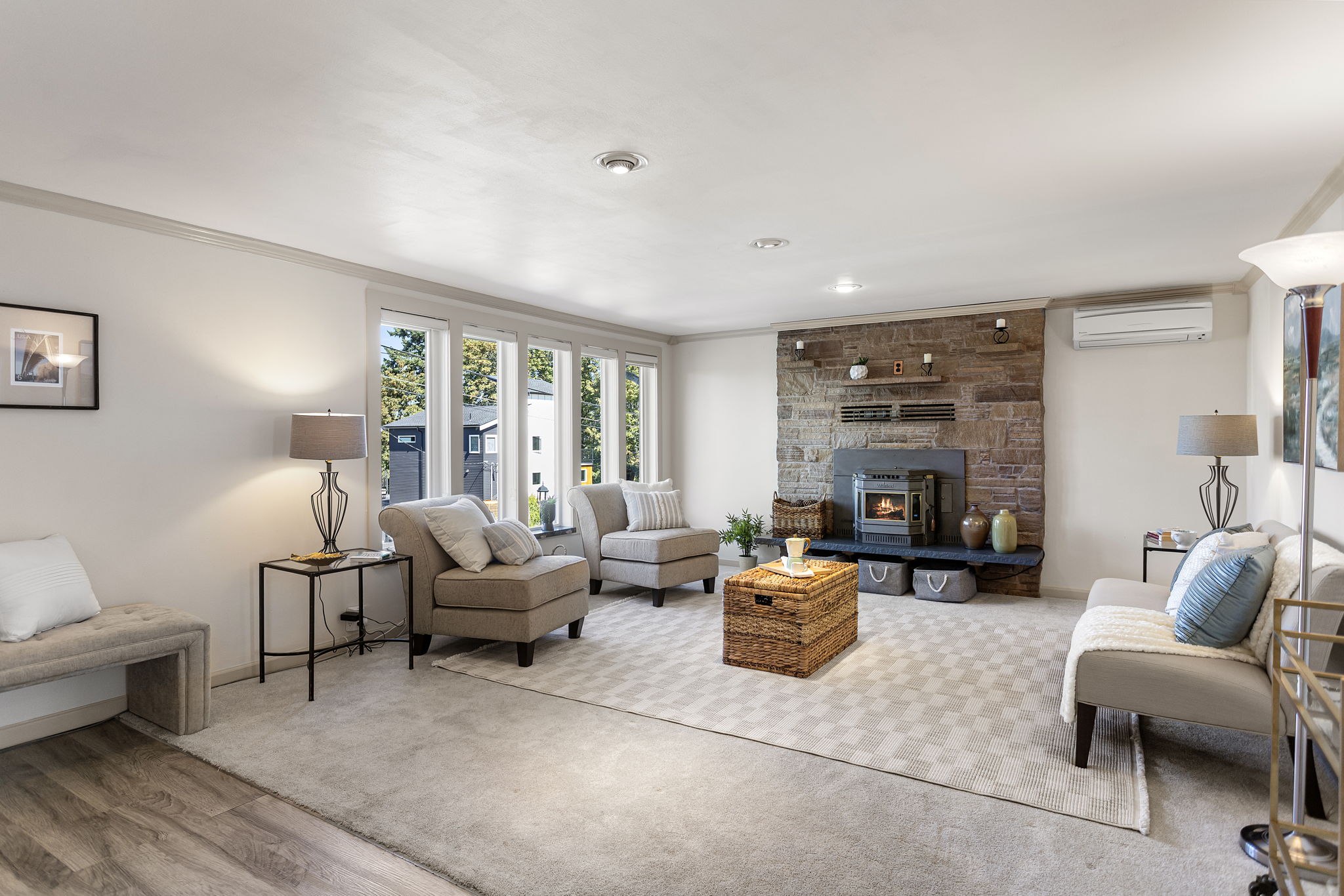 A wall of windows brings in abundant natural light and keeps the front garden in view from the main living room.