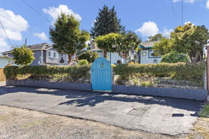 Room for up to five cars off-street in front—an unusually practical feature for a city property.