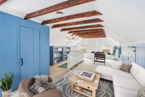 Lilac Rd-S2304-046 family room virtually staged watermark