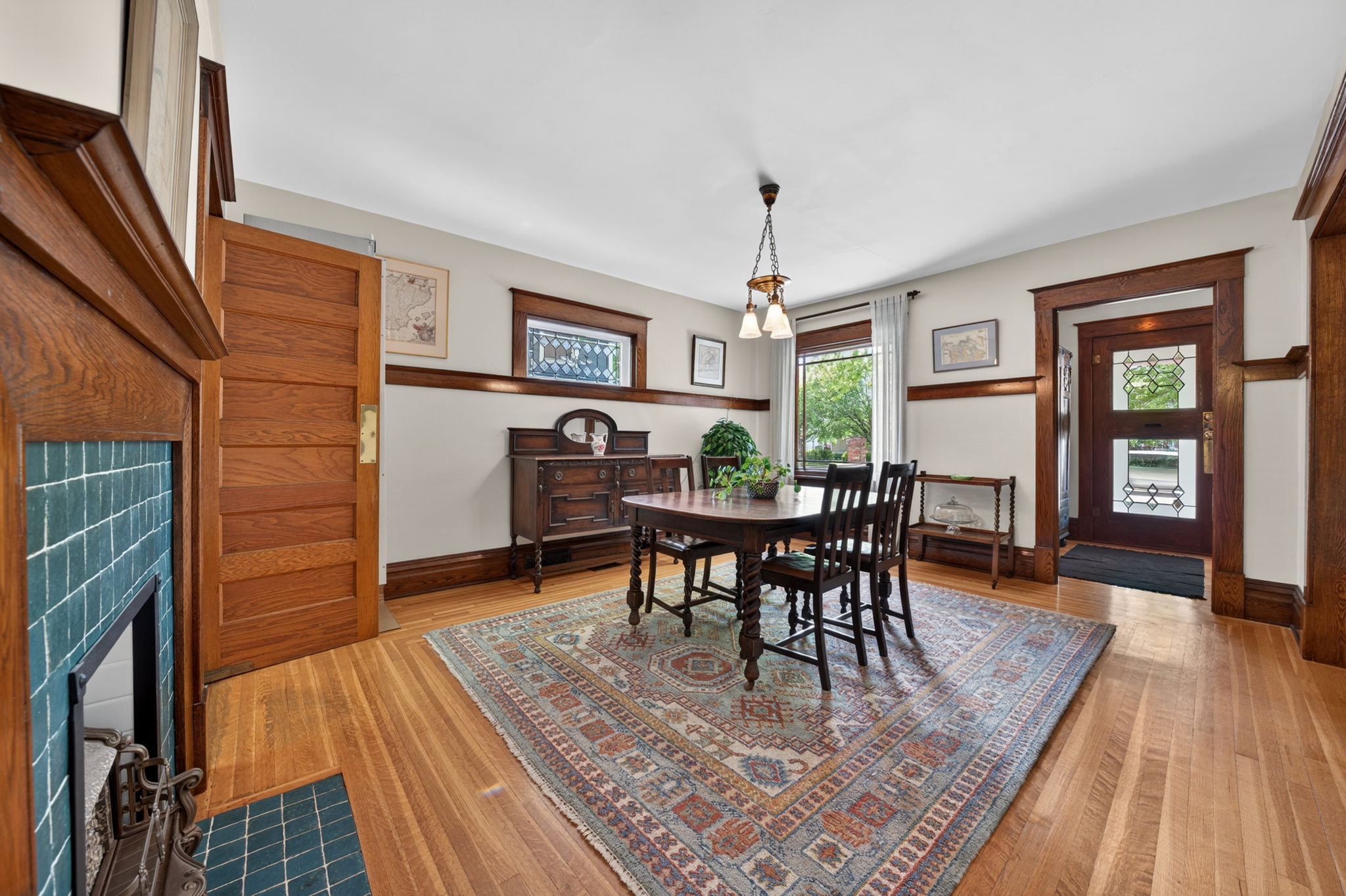 Dining room framed by original quarter-sawn oak and preserved heritage millwork