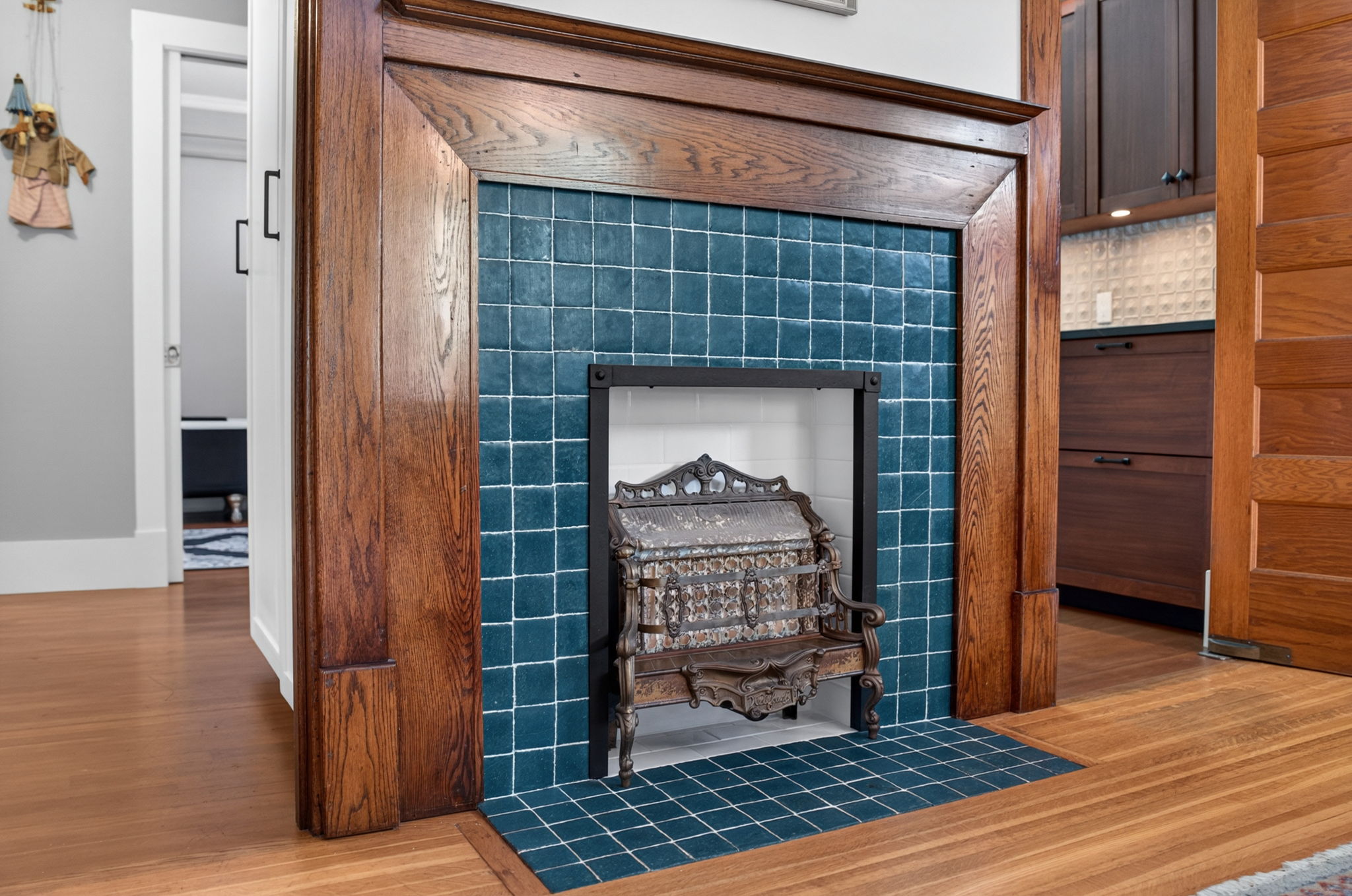 Jtul fireplace insert set in its original glazed tile surround