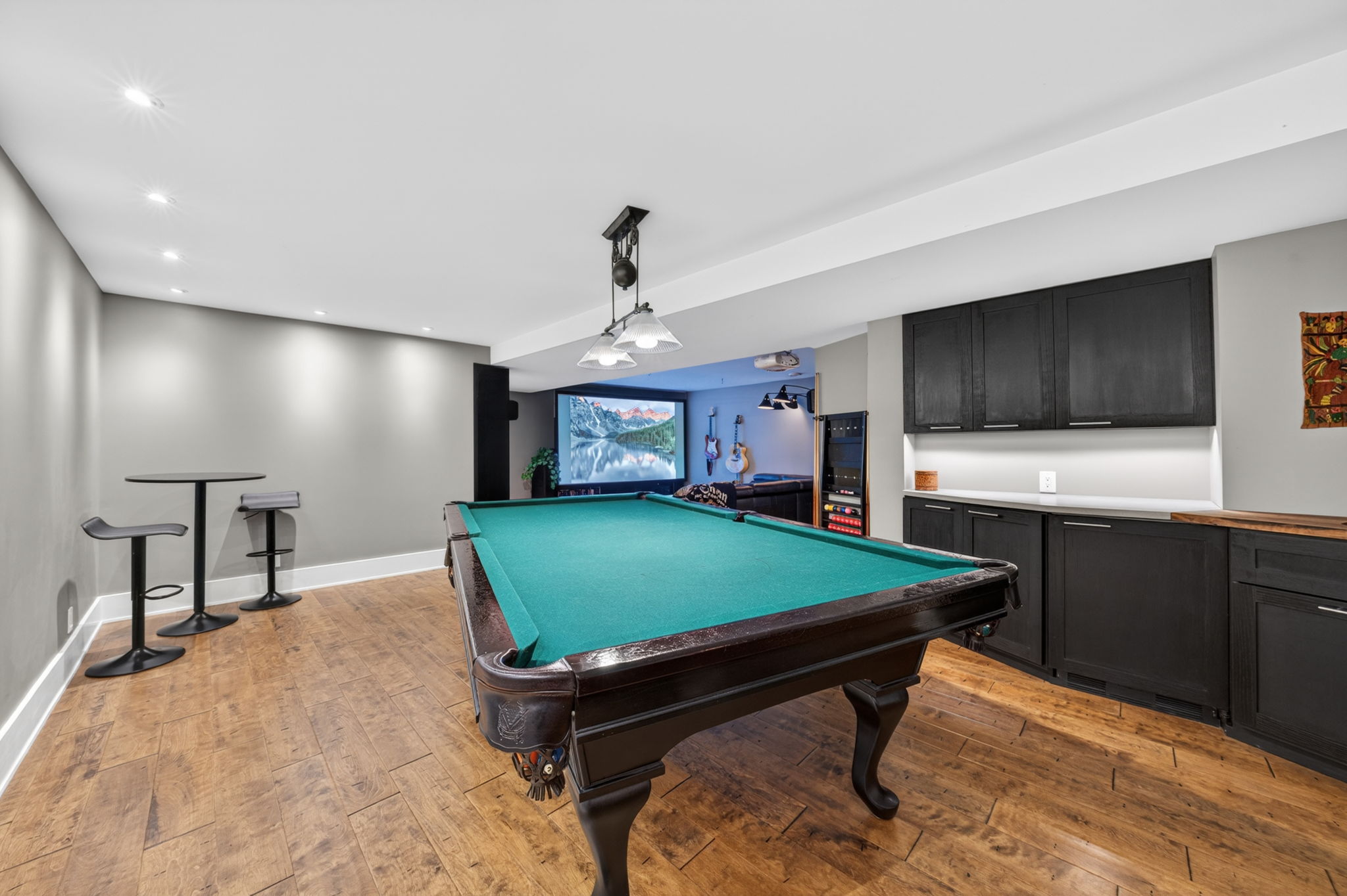 Full-ceiling-height lower level with room for a full-size games area