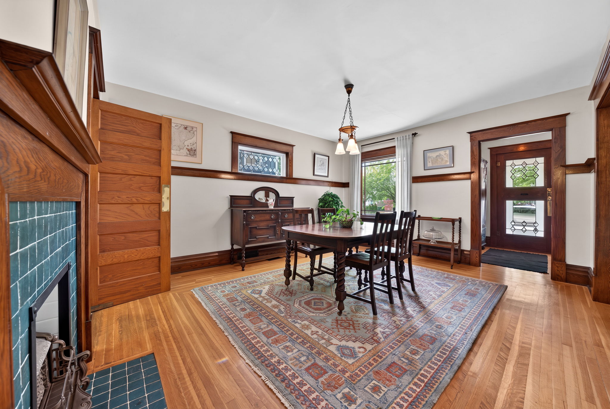 Dining room framed by original quarter-sawn oak and preserved heritage millwork
