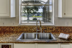 View of Pool & Lake from Kitchen