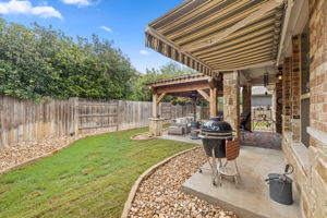 Backyard with retractable awning