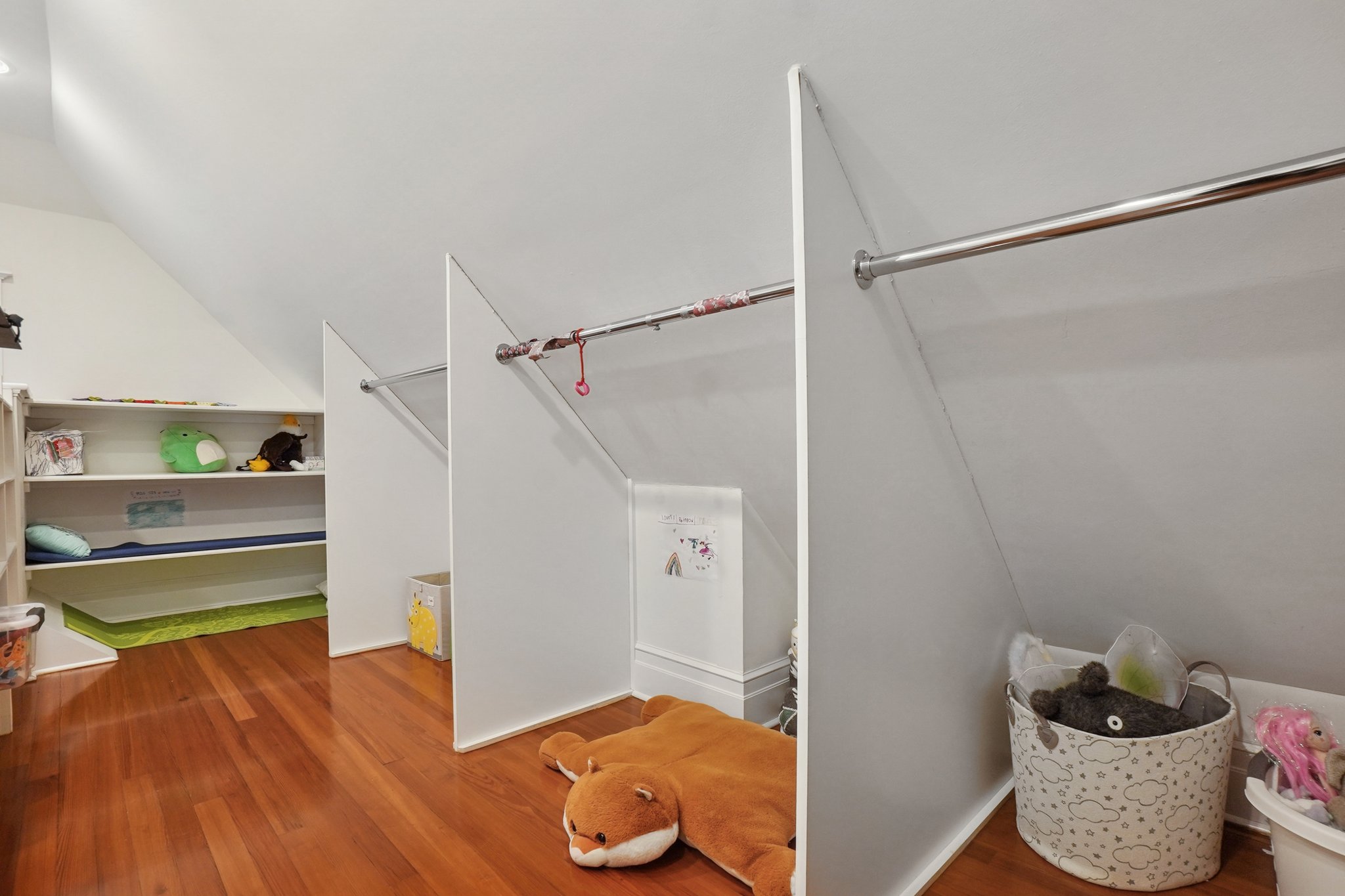 There are two walk-in closets in the primary. One is adjacent to the bath, this second is up a secret flight of stairs. Currently used as a whimsical kids’ clubhouse.