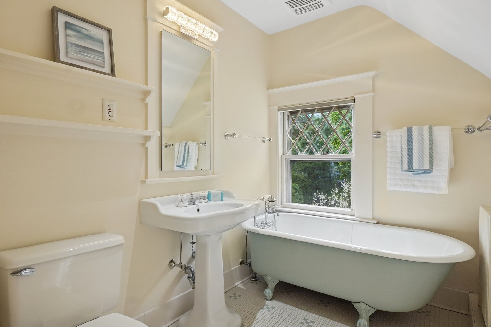 3rd floor hall bath with claw foot tub and separate shower