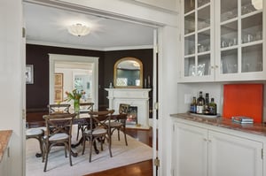 Convenient bar area connects family room and dining room.
