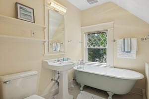 3rd floor hall bath with claw foot tub and separate shower
