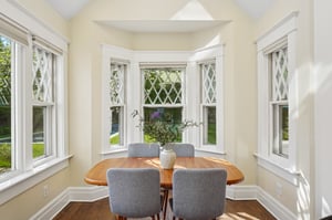 The kitchen's eating nook is a great place to gather for meals, homework or crafts, all while overlooking the sparkling pool. Skylights above for star gazing!