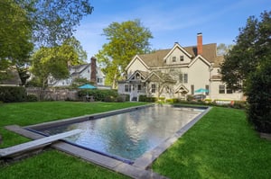 A private resort in the heart of Montclair. With a sparkling Waterworks-tiled pool, lush green lawn, and timeless architecture as the backdrop, this backyard is pure magic—perfect for summer gatherings, morning swims, or golden hour lounging.