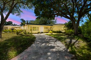 Front Exterior 1 of 3 day to dusk.jpeg