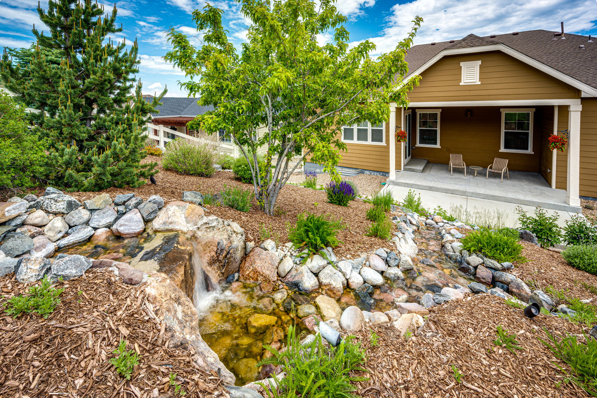 Beautiful Waterfall Feature in Open Space Backyard