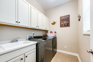 Laundry Room w Utility Sink & Ample Storage