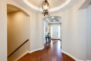 Lovely Entry Hall w Stairs to Basement