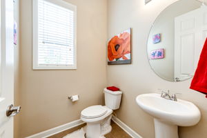 Powder Bathroom by 2 Car Garage Entrance