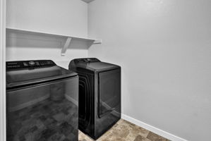 Laundry Room Features Convenient Shelving