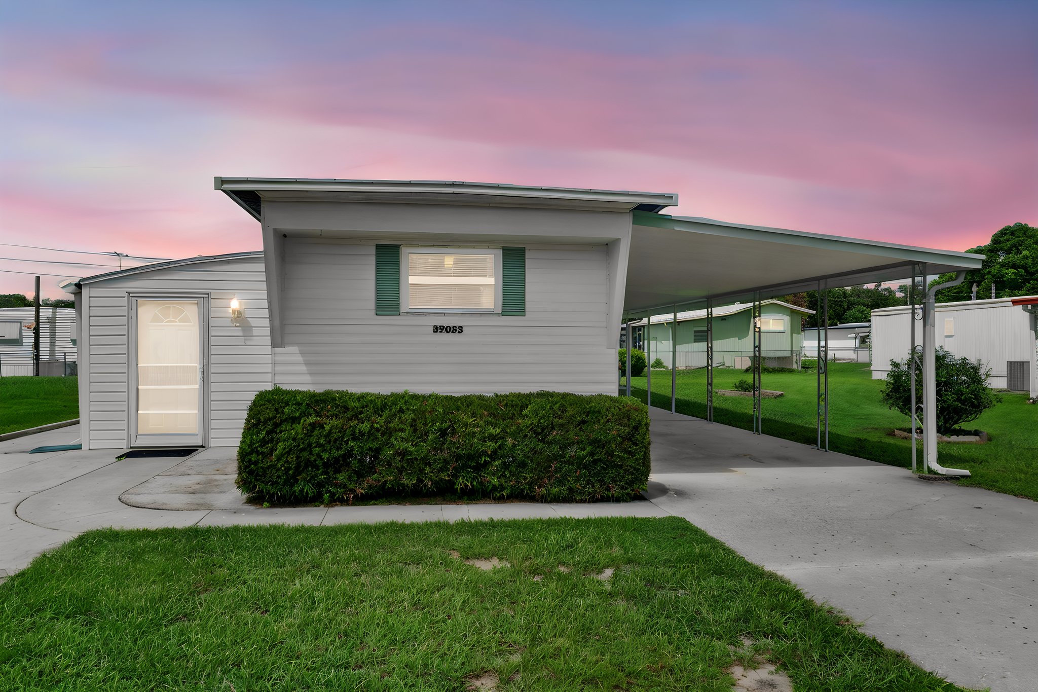 39053 Ola Ave, Zephyrhills, FL 3354216 day to dusk.jpeg