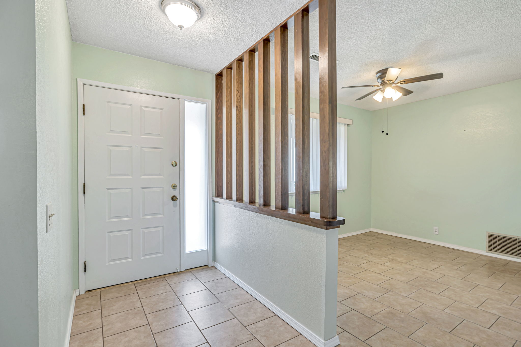Front Door inside entry, & dining area