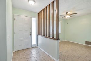 Front Door inside entry, & dining area