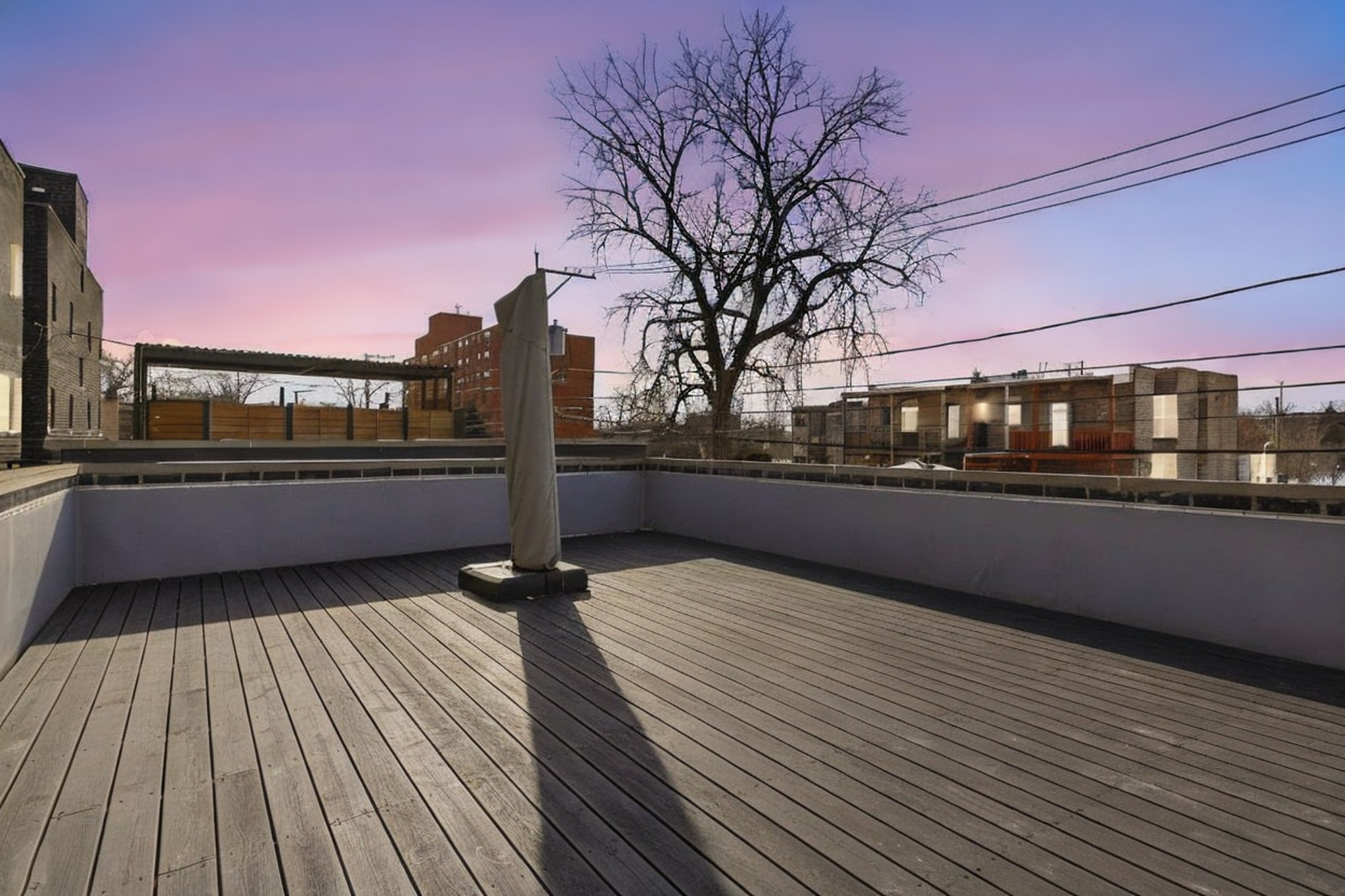 3914 S King Dr 1S -Deck day to dusk.jpeg