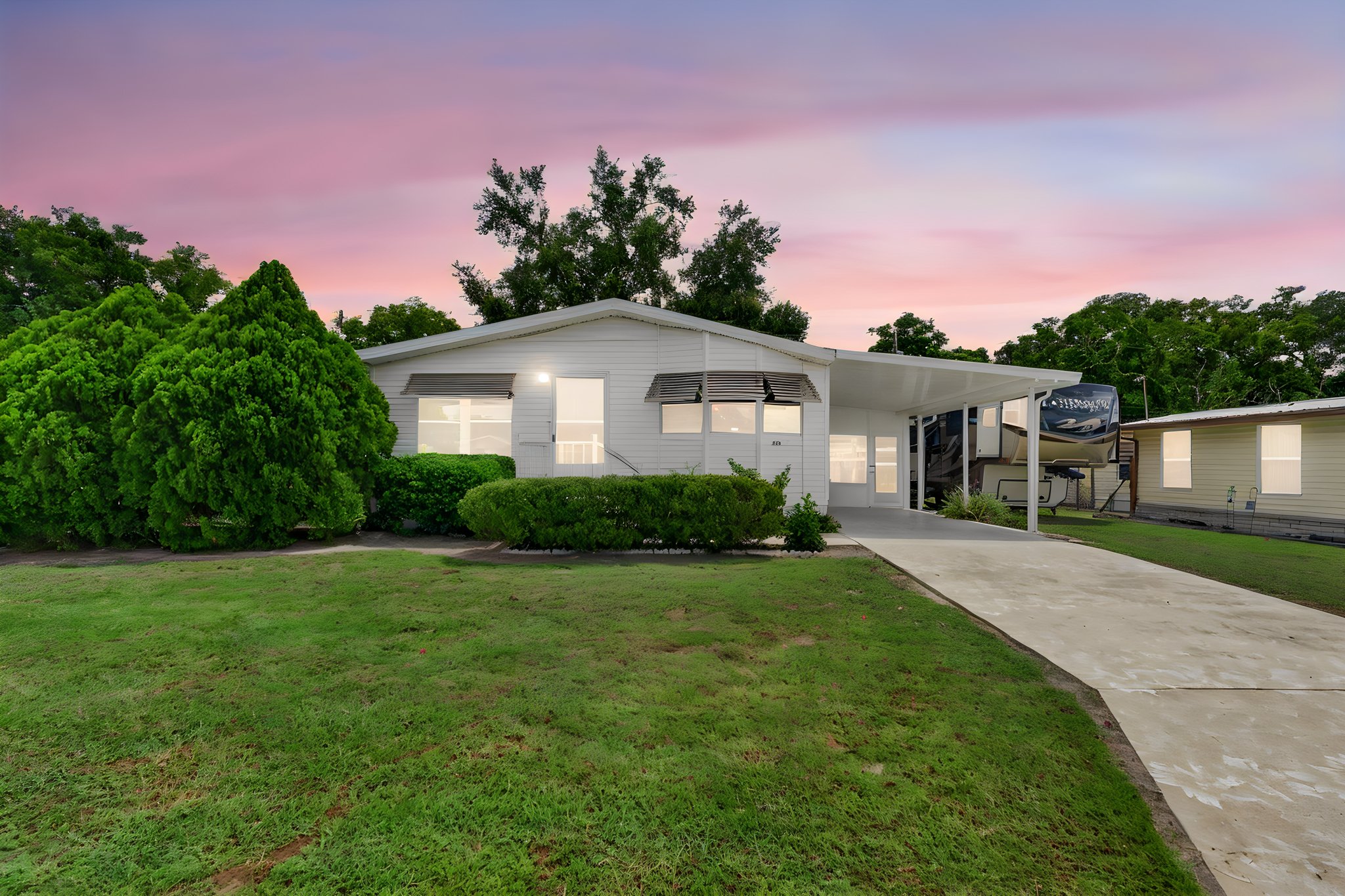 39200 Ola Ave, Zephyrhills, FL 33542-17 day to dusk.jpeg