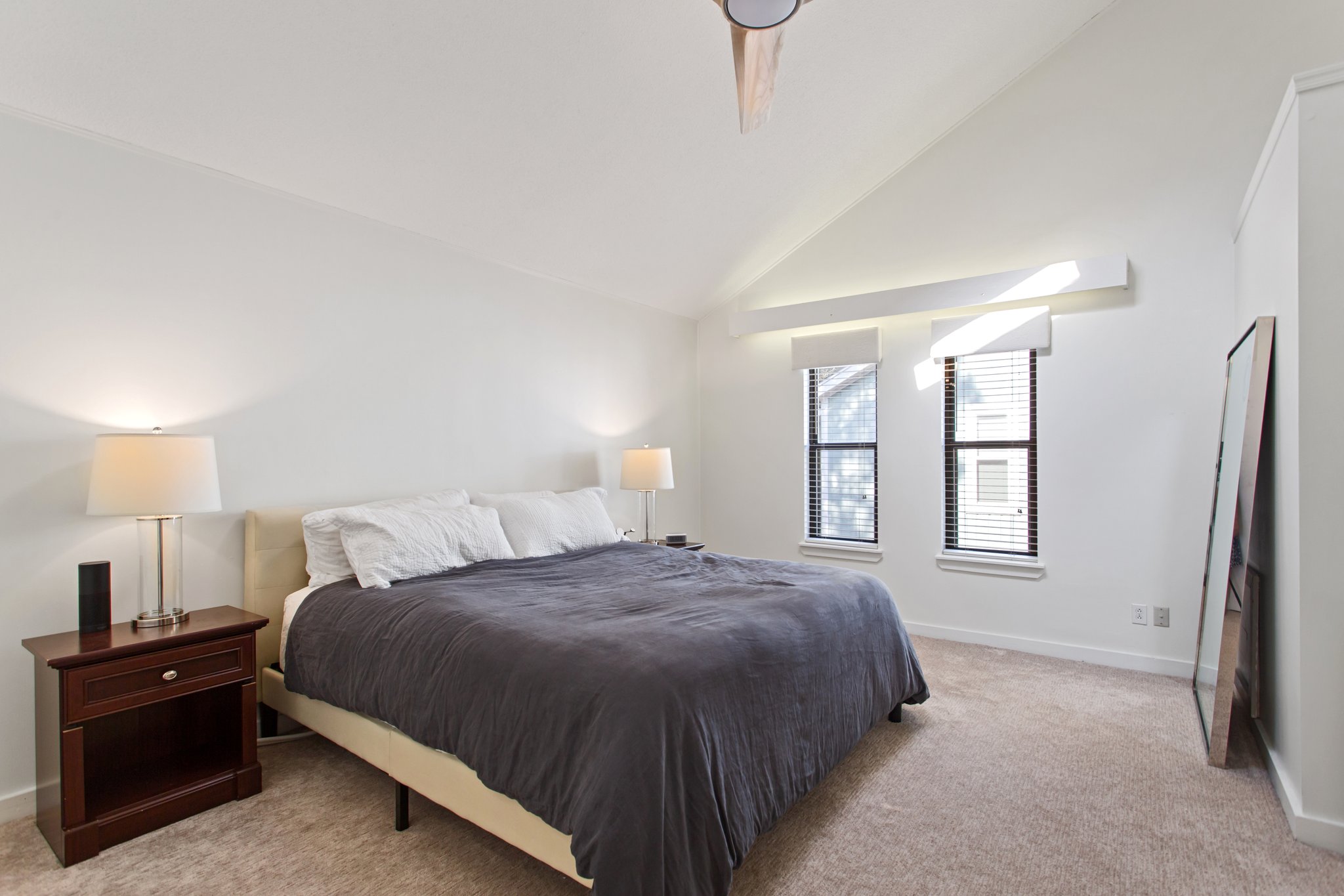 Serene Upstairs Primary Bedroom with high ceilings and oversized closet