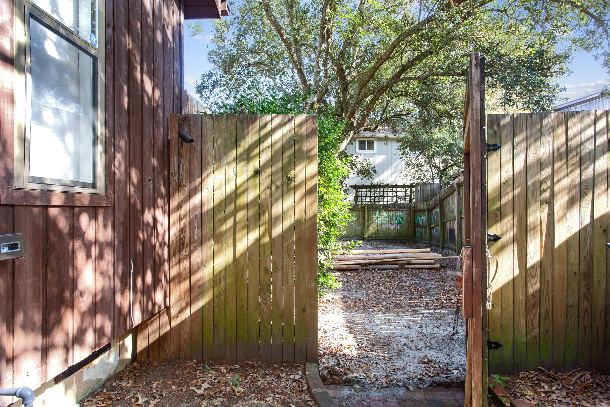 Privacy fence with gates for convenient backyard access