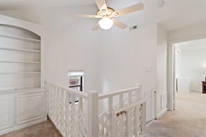 Upstairs cozy open loft with built-ins