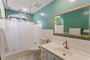 Refreshed primary bathroom complete with a jetted tub