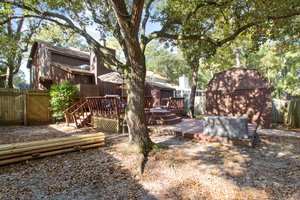 Enjoy a spacious yard alongside the inviting deck