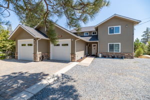 Front of Home With Additional Gravel Parking