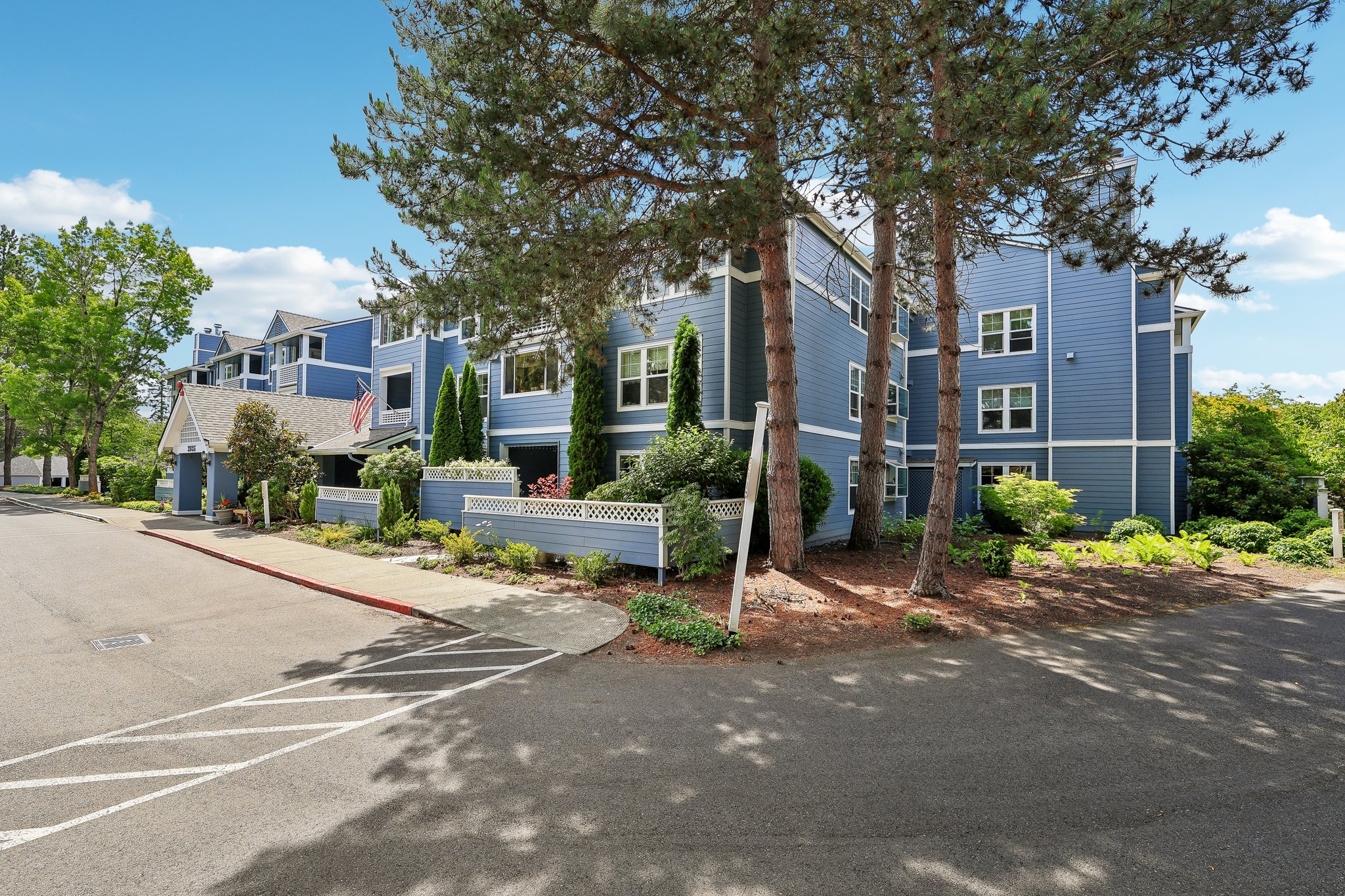 Lower corner condo with lots of windows and privacy