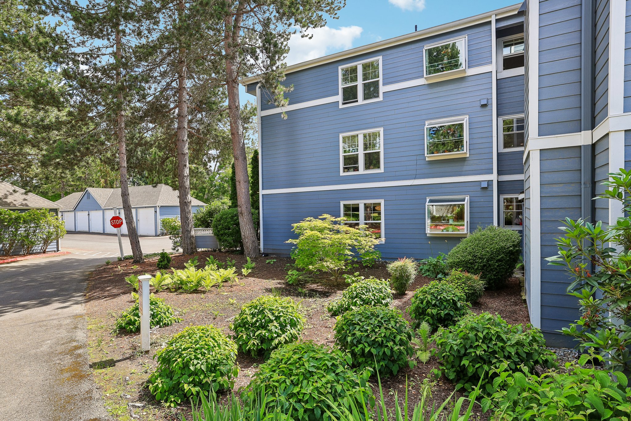 Lower Corner unit with large landscaped area just outside provides privacy