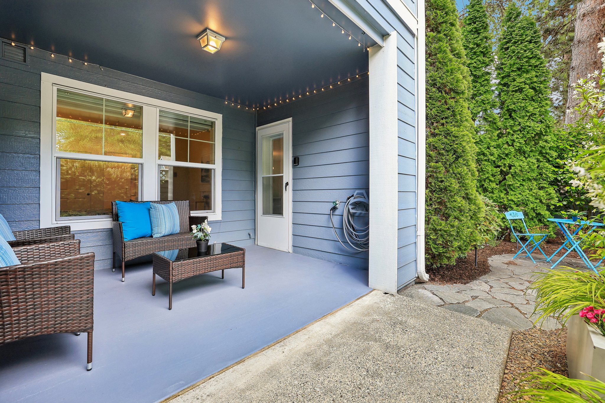 Covered patio with entry to your corner  condo.