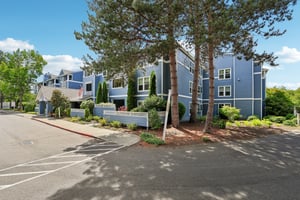 Lower corner condo with lots of windows and privacy