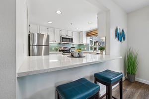 Peninsula countertop makes for good conversation space with the chef.