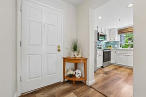 Front door enters into hallway of the Olympia building.