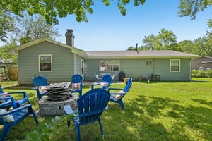 fire pit seating and view to back patio