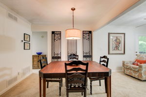 21 Dining w Main BR Access + Sunroom