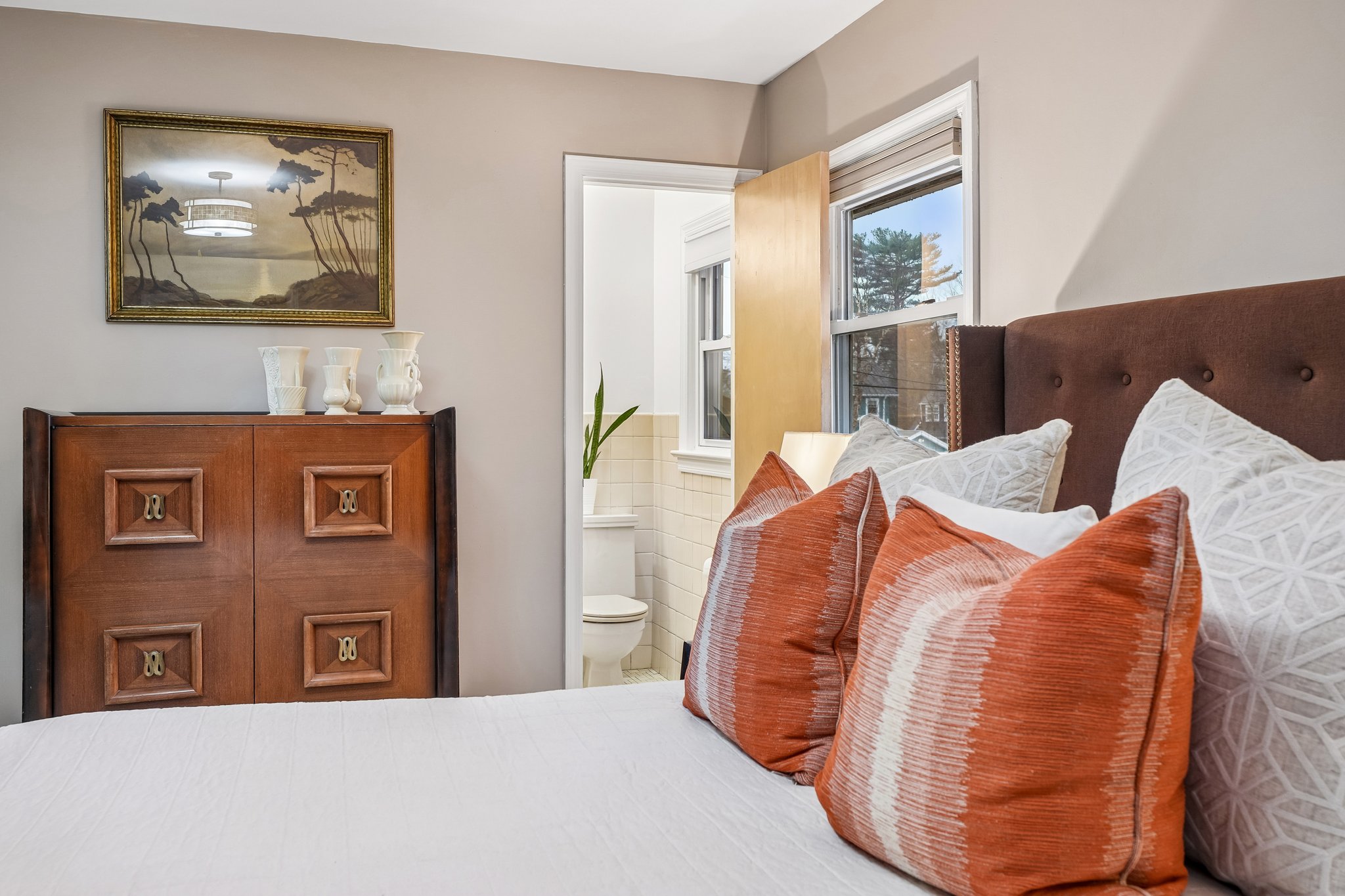 Primary has its own ensuite bath - designed for easy mornings and restful nights.