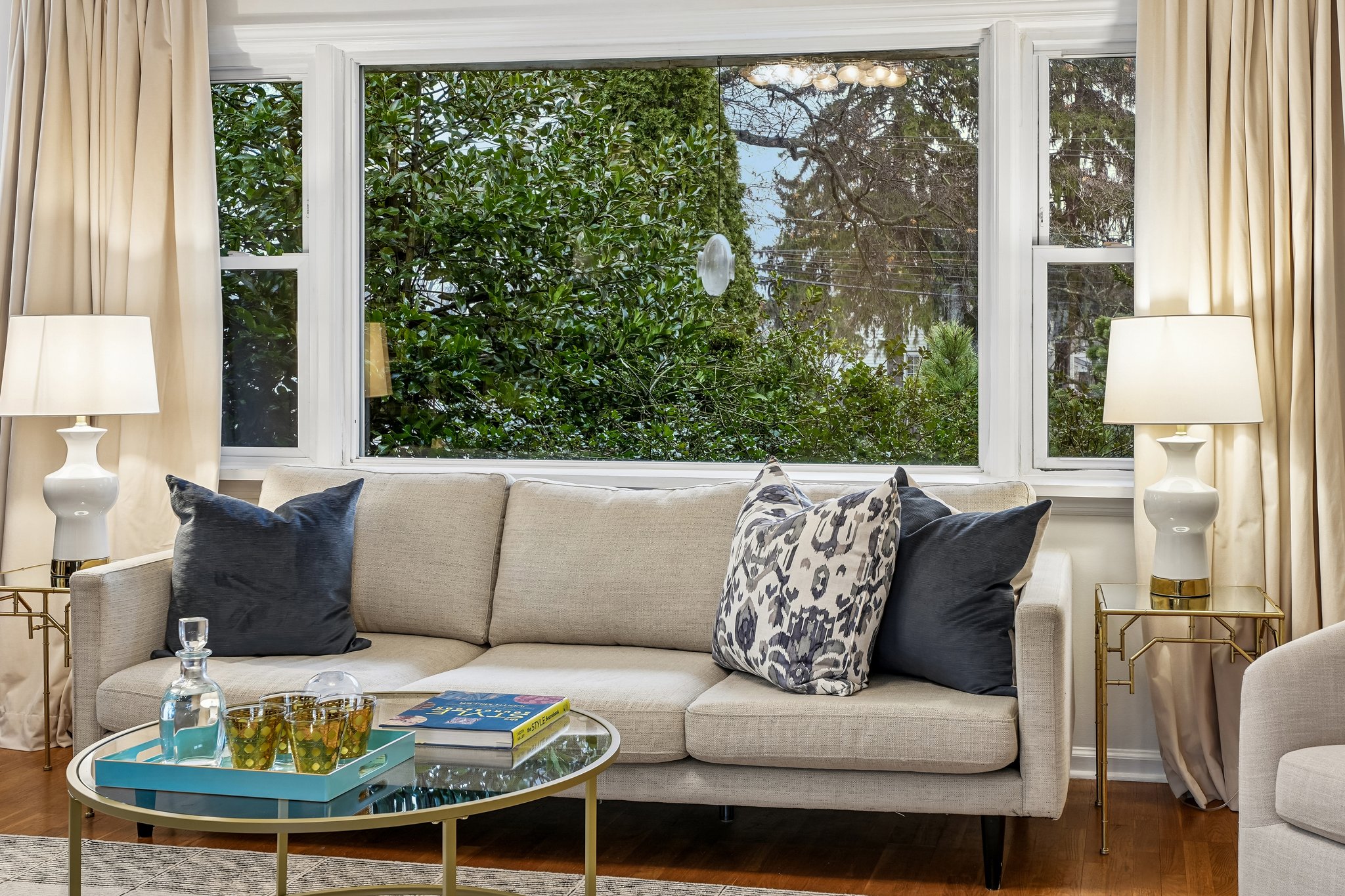 Tucked back from the street, this gem feels wonderfully private - a quiet retreat surrounded by greenery while still just a block from Brookdale Park and under a mile to Watchung Plaza and NYC trains.