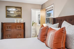 Primary has its own ensuite bath - designed for easy mornings and restful nights.