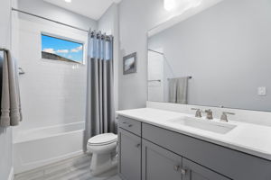 Beautiful guest bathroom with picture window to allow for natural light