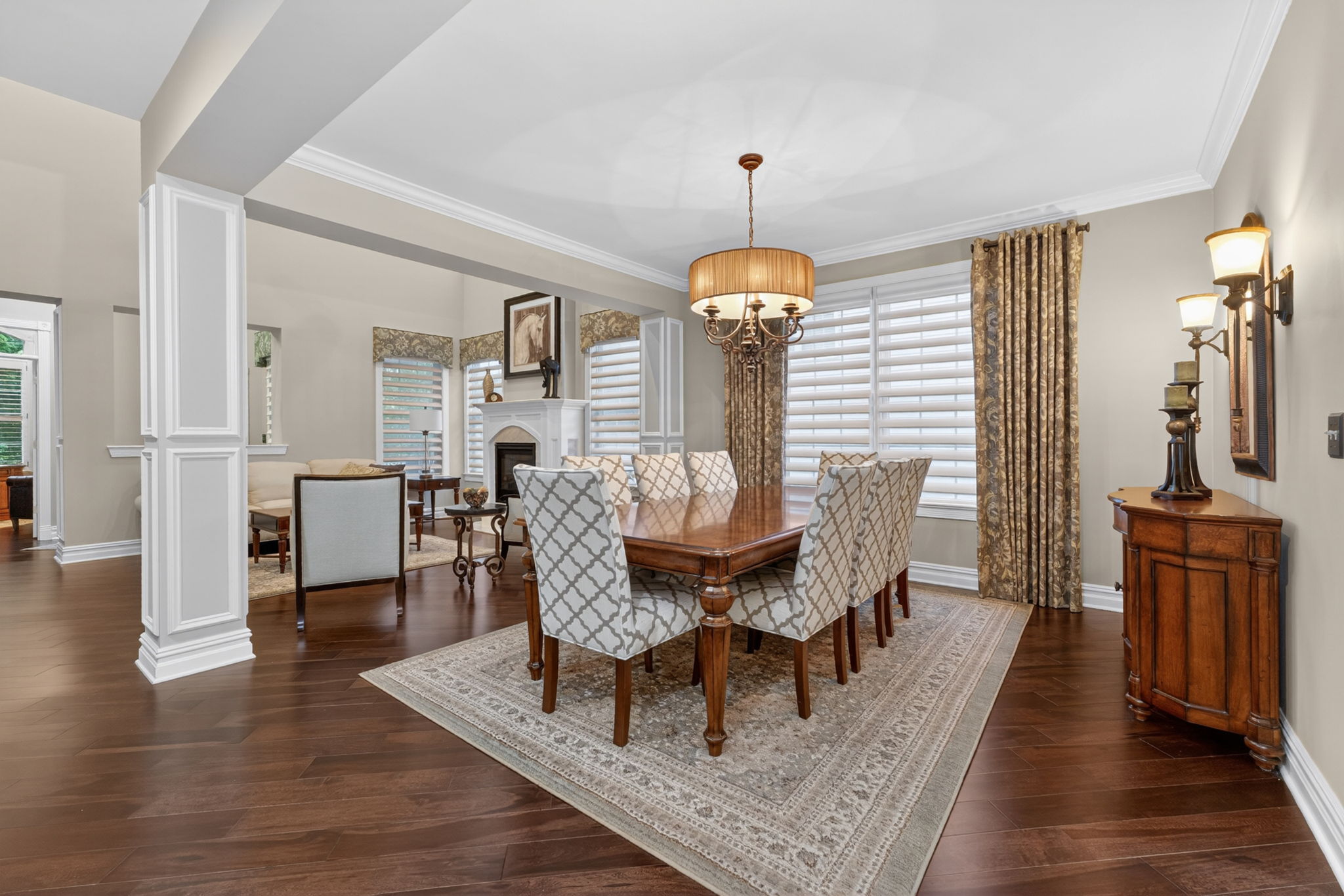 Host elegant dinner parties with confidence in the formal dining room, where elegant lighting creates the perfect ambiance for intimate gatherings.