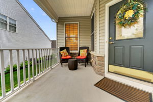 Front Covered Porch Plus FULL UNFINISHED BASEMENT Utilities and abundant storage.