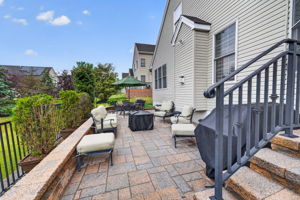 Paver Patio Enjoy your quiet morning coffee on the extended paver patio with block wall and wrought iron railing.