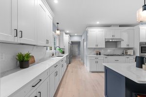 Quartz Countertops with Matching Quartz Backsplash